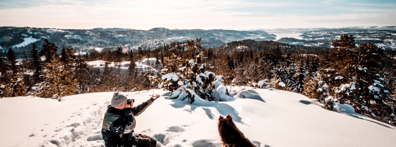 With dog in the mountains